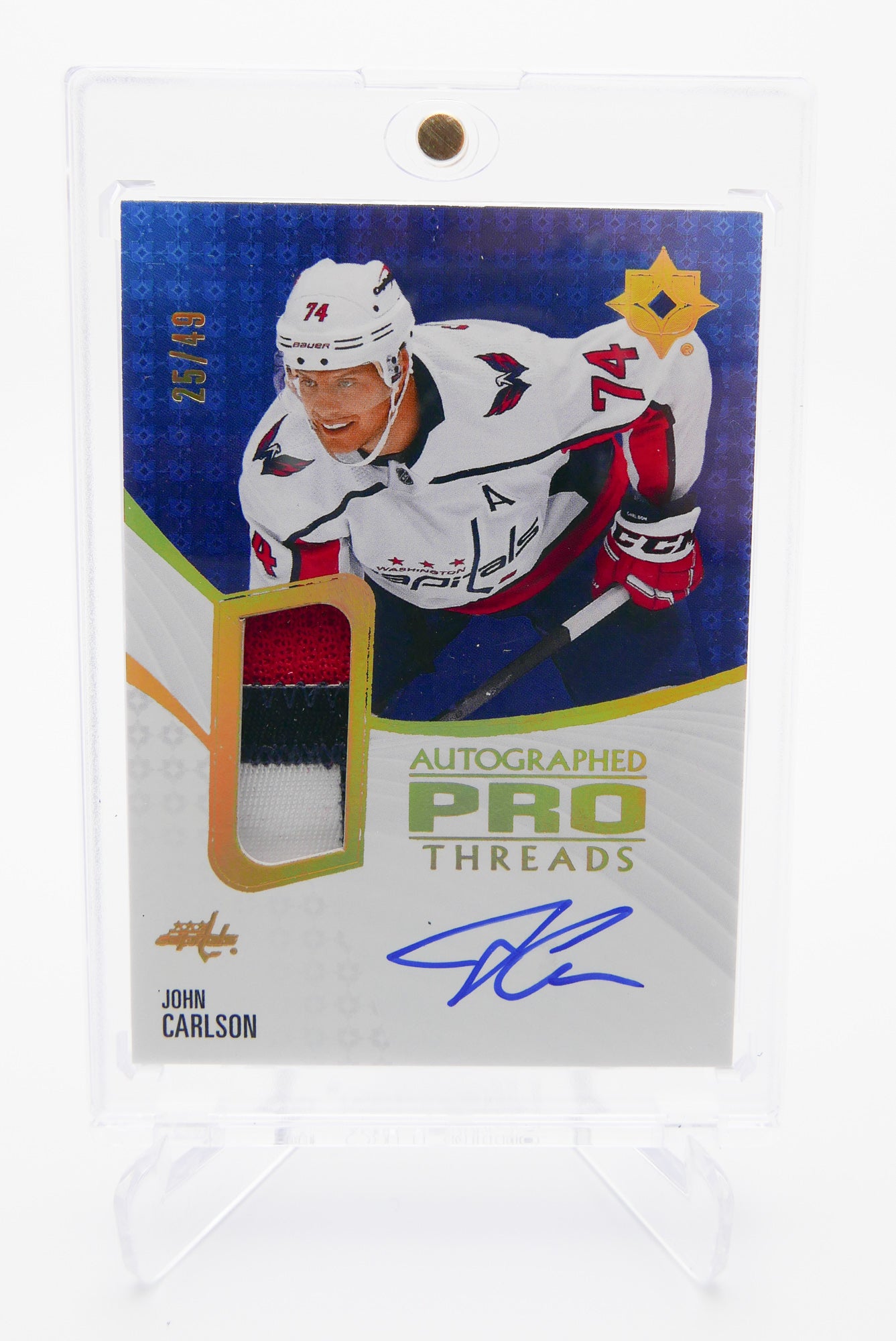 2023-24 Upper Deck Ultimate Collection Hockey John Carlson Autographed Pro Threads Patch Auto 25/49